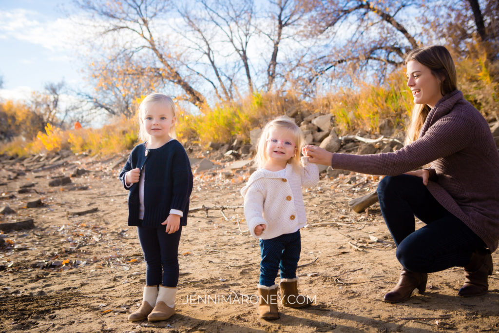 Photos of sisters by Jenni Maroney Portrait Boutique from an outdoor family session in Boulder Colorado