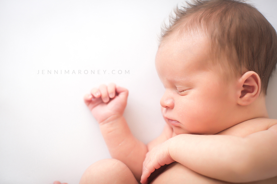 Denver newborn photographer and Boulder newborn photographer, Jenni Maroney shares an all white, neutral baby boy Boulder newborn session at her Boulder photography studio.