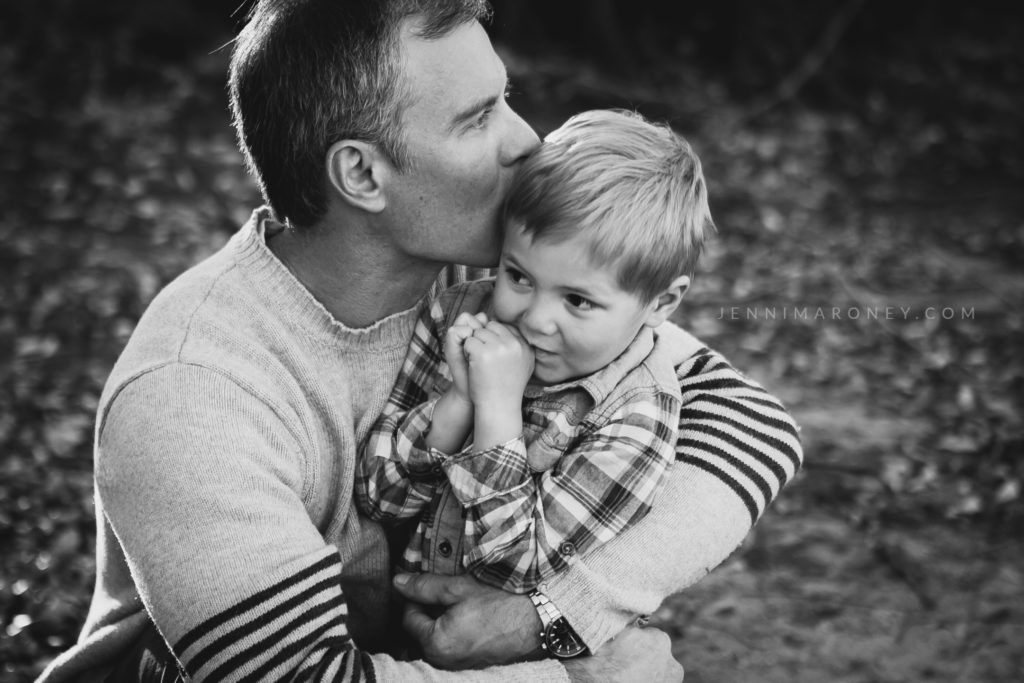 Dad and son black and white outdoor photo with Boulder family photographer, Jenni Maroney.